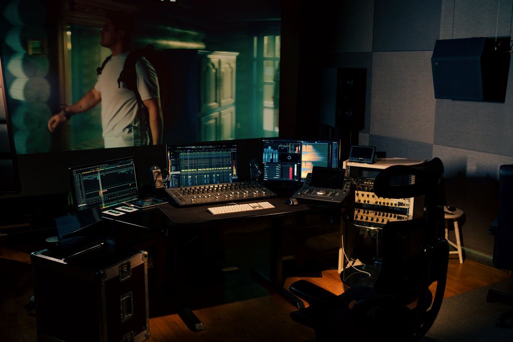 Sunrise Film mixing room with a film on the projection screen.